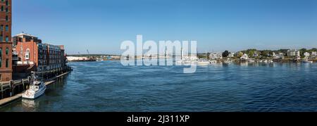 PORTSMOUTH, USA - SEP 27, 2017:  view along the river Piscataqua in Portsmouth with bridge Sarah Mildred long at horizon. Stock Photo