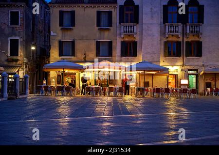 Evening view of the Ristorante / Bar Al Cavallo from Campo Santi Giovanni e Paolo, Venice, Italy, Europe Stock Photo