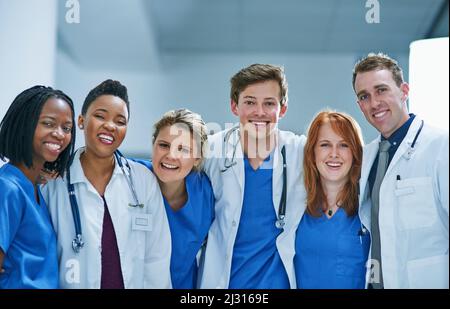 We all want the best for you. Portrait of a team of confident young doctors working in a hospital. Stock Photo