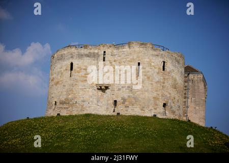 York Castle fortified complex in city of York, England, North Yorkshire  medieval Norman castle commonly referred to as Clifford's Tower Stock Photo