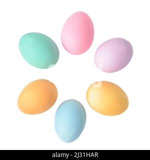 Pastel coloured Easter eggs isolated on white background, round shape border, top view Stock Photo