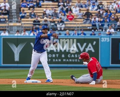 Los Angeles Dodgers' Hanser Alberto (17) scores on a double hit by