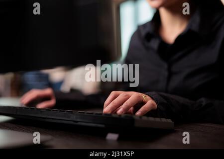 Neural network programmer developing artificial intelligence data processor. Security application engineer encrypting vital company information on blockchain system. Close up. Stock Photo