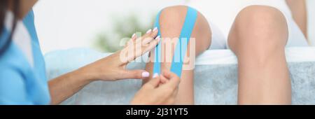 Treatment after sports muscle injury Stock Photo