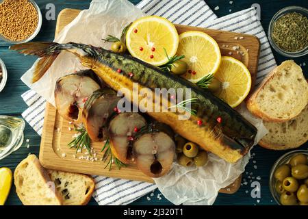 Concept of tasty food with smoked mackerel, top view Stock Photo