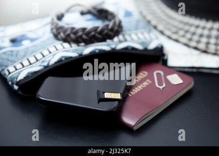 SIM card for smart phone. Changing the SIM card. Stock Photo