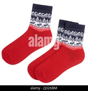 Pair of Nordic style socks with Norwegian knitted pattern isolated on a white background Stock Photo