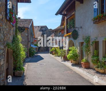Alley in Yvoire, Haute-Savoie department, Auvergne-Rhone-Alpes, France Stock Photo