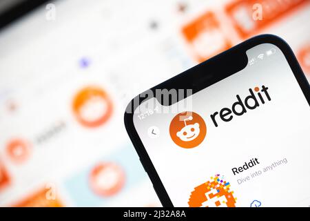 Reddit logo displayed on a smartphone device close-up view photo Stock Photo