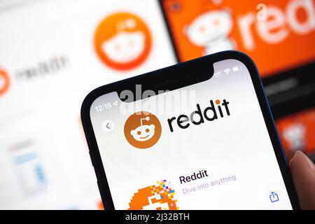 Reddit logo displayed on a smartphone device close-up view photo Stock Photo