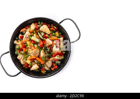Chicken stir fry and vegetables isolated on white background Stock Photo