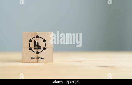 Industry 4.0 concept. Internet of things network, smart factory solution.Communication network. Industrial technology concept. Symbols of industry 4.0 Stock Photo