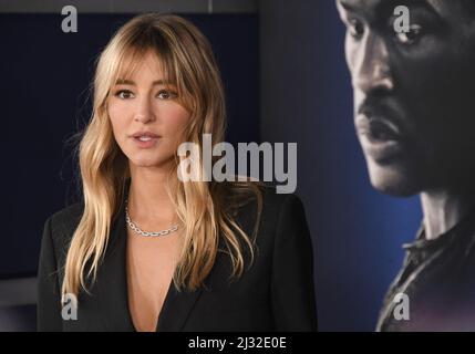 Hassie Harrison arrives at the AMBULANCE Los Angeles Premiere held at
