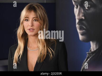 Hassie Harrison arrives at the AMBULANCE Los Angeles Premiere held at