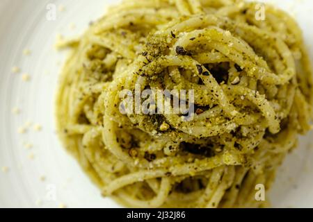 basil pesto pasta on a white background Stock Photo