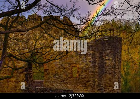 Ewloe castle with rainbow in Wepre Park. Stock Photo