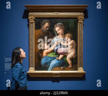 (Embargoed till 00.01 on Wednesday 6 April 2022) National Gallery, London, UK. 5 April 2022. For centuries Raphael (1483-1520) has been recognised as the supreme High Renaissance painter, visualising central aspects and ideals of Western culture. The exhibition marks the 500th anniversary of Raphael’s death in 2020, delayed because of Covid restrictions, and opens from 9 April-31 July 2022. Image: Raphael, The Holy Family with the Infant Saint John the Baptist ('The Madonna of the Rose’), about 1516-17. Oil on wood, transferred to canvas. Museo Nacional del Prado, Madrid. Credit: Malcolm Park/ Stock Photo