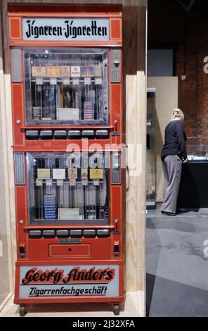 Chemnitz, Germany. 05th Apr, 2022. A cigarette vending machine from 1930.  The device is part of the exhibition 