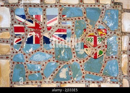 National flag of  Fiji on stone  wall background. Flag  banner on  stone texture background. Stock Photo