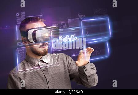 Businessman looking through Virtual Reality glasses, tech concept Stock Photo