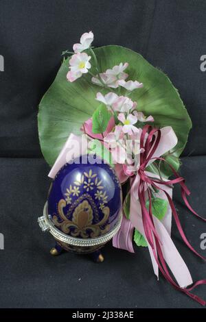 Easter decorations. Easter eggs. Coloured eggs. Decorated eggs. Eggshell with chicken inside. Resurrection celebration. Spring event. Religious. Stock Photo
