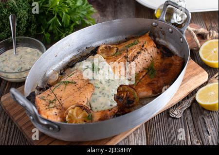 Oven roasted salmon with fresh tartar sauce Stock Photo