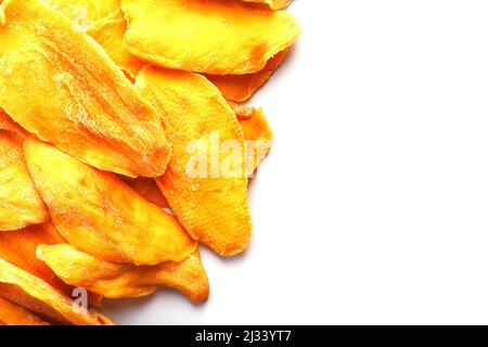 Orange Slices of Dried Sugar Mango Isolated on White Background Stock Photo