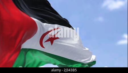 Detail of the national flag of Sahrawi Arab Democratic Republic waving in the wind on a clear day. Sahrawi Arab Democratic Republic is a partially rec Stock Photo