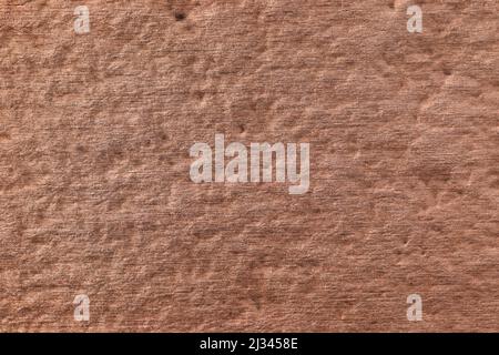 Textured brushed metallic background in copper color. Stock Photo