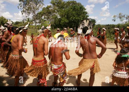 porto seguro, bahia, brazil - december 20, 2010: Indians from the Pataxos ethnic group are seen during traditional dance at Aldeia Imbiriba in the cit Stock Photo