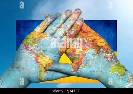 world map in hands against the sky Stock Photo
