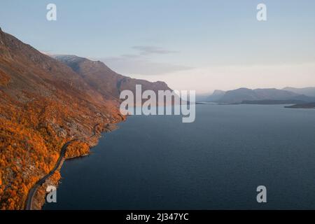 Landscape with mountains and lake in Stora Sjöfallet National Park in autumn in Lapland in Sweden Stock Photo