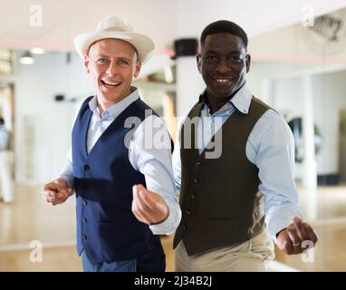 Two professional dancers practicing lindy hop in dance class Stock Photo