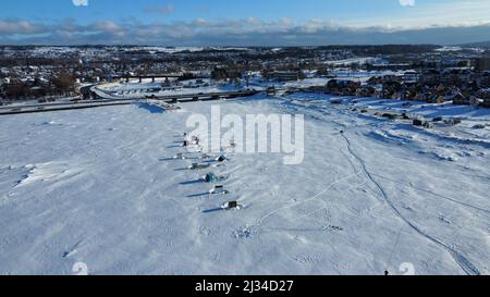 A lot of cabins for ice fishing on the frozen St-Laurence River in  Rimouski, Quebec, Canada Stock Photo - Alamy