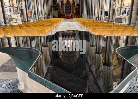 the water font with reflection of the Nave, Quire and Trinity Chapel at Salisbury Cathedral, England. Stock Photo