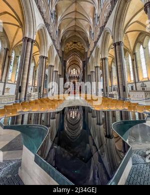 the water font with reflection of the Nave, Quire and Trinity Chapel at Salisbury Cathedral, England. Stock Photo