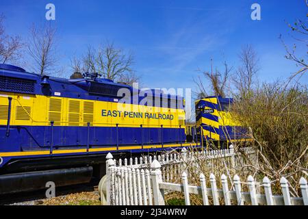 Reinholds, PA, USA - April 2, 2022: The East Penn Railroad locomotives are parked at the Reinholds train station. Stock Photo