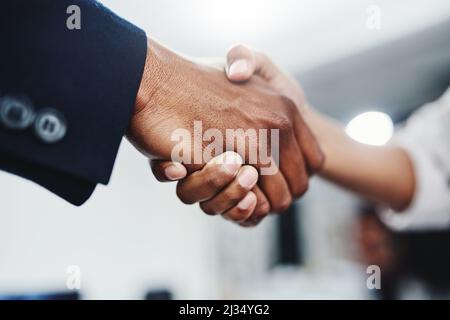 Great doing business with you. Closeup shot of a handshake between two unrecognizable people at the office. Stock Photo