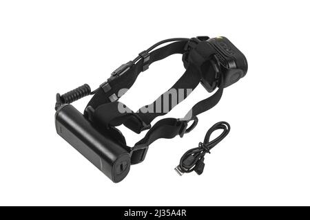 Modern LED headlamp. Portable lighting device mounted on the head. Isolate on a white background. Stock Photo
