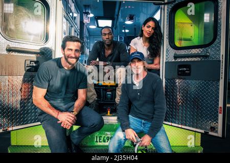 (from left) Jake Gyllenhaal, Yahya Abdul-Mateen II, director Michael Bay and Eiza González on the set of 'Ambulance' (2022). Photo credit: Andrew Cooper/ Universal Pictures/ THA Stock Photo
