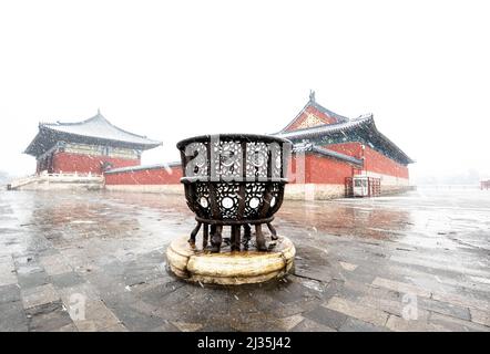 Ancient building in Temple of Heaven in the snow Stock Photo