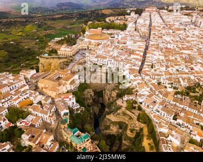 Ronda landscape and buildings with Puente Nuevo Bridge, Andalusia, Spain Stock Photo