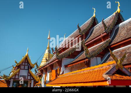 Wat Phrathat Doi Kham, Buddha pagoda and golden chedi in Chiang Mai, Thailand Stock Photo