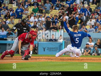 April 9 2022: Los Angeles catcher Austin Barnes(15) hits a homer during the  game with Los Angels Dodgers and Colorado Rockies held at Coors Field in  Denver Co. David Seelig/Cal Sport Medi(Credit