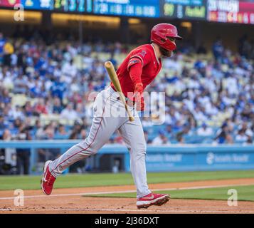 Los Angeles Angels' Jared Walsh reacts after he hit a two-run home run that  scored Phil Gosselin during the fourth inning of a baseball game against  the Seattle Mariners, Sunday, Oct. 3