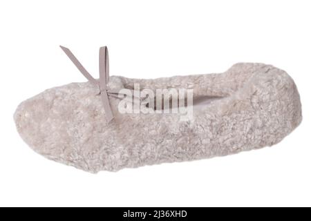 Slippers isolated. Close-up of a single of female pink warm and soft cosy terry slippers isolated on white background.  Womans shoes. Stock Photo