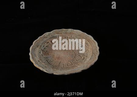 Chinese ceramic known as 'Yue ware' unwatered from 9th-10th century Cirebon shipwreck found in 2003 in Java Sea north of Cirebon, West Java, Indonesia. Photographed at the Directorate of Underwater Archaeology, Indonesia's Ministry of Culture and Tourism in Jakarta, Indonesia. Stock Photo