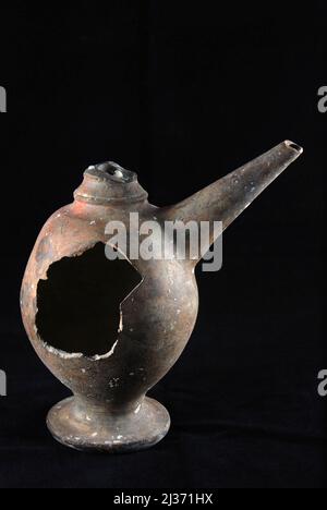 Chinese ceramic known as 'Yue ware' unwatered from 9th-10th century Cirebon shipwreck found in 2003 in Java Sea north of Cirebon, West Java, Indonesia. Photographed at the Directorate of Underwater Archaeology, Indonesia's Ministry of Culture and Tourism in Jakarta, Indonesia. Stock Photo