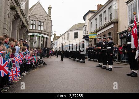 Freedom Parade in Helston Cornwall,RNAS Culdrose Navy personnel form up at approx 10am and march down Meneage Street to the Guildhall, where the Mayor and Captain of Culdrose inspect the guard. The Mayor's Chaplain leads prayers, the Mayor addresses the Parade and then the Captain of RNAS Culdrose responds. The Parade is an important day in the civic calendar, as well as for the people of the town, many of whom have links with the air base. All are welcome to watch this unique and impressive spectacle, Credit: kathleen white/Alamy Live News Stock Photo