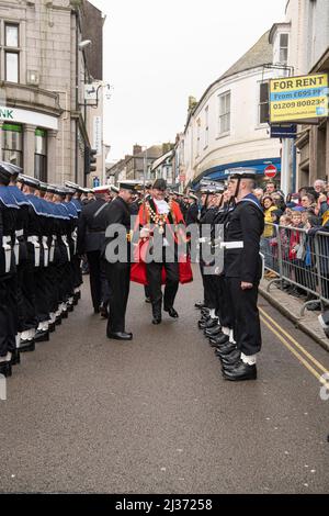 Freedom Parade in Helston Cornwall,RNAS Culdrose Navy personnel form up at approx 10am and march down Meneage Street to the Guildhall, where the Mayor and Captain of Culdrose inspect the guard. The Mayor's Chaplain leads prayers, the Mayor addresses the Parade and then the Captain of RNAS Culdrose responds. The Parade is an important day in the civic calendar, as well as for the people of the town, many of whom have links with the air base. All are welcome to watch this unique and impressive spectacle, Credit: kathleen white/Alamy Live News Stock Photo